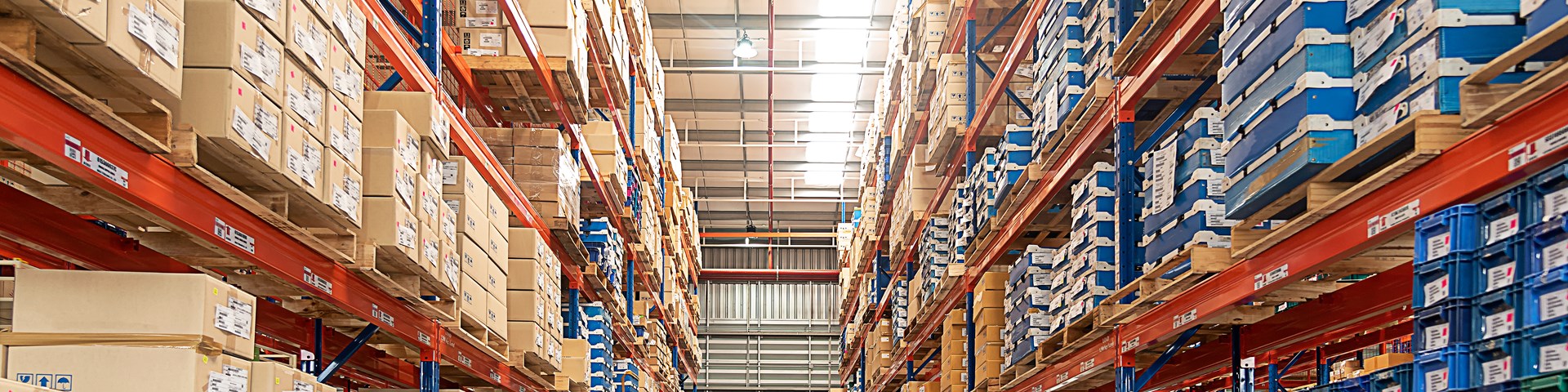 large warehouse stacked full of customer parcels